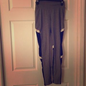 Gray, white, and black mesh leggings. Size M.
